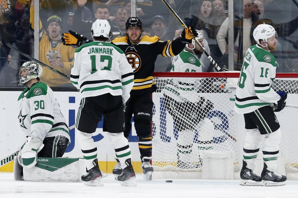 Boston Bruins' David Pastrnak (88) celebrates his goal against Dallas Stars' Ben Bishop (30) during the third period of an NHL hockey game in Boston, Thursday, Feb. 27, 2020. (AP Photo/Michael Dwyer)