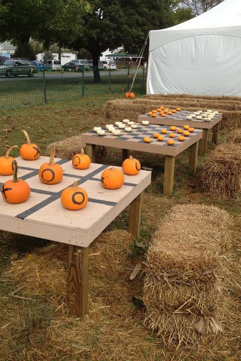 <p>... or tic tac toe! Use a black marker to mark pumpkins as "X" or "O" and tape up a game board on a sturdy table. For checkers, a mix of white and orange mini pumpkins makes jumping your opponent all the more satisfying.</p><p><em><a href="http://kidfriendlythingstodo.com/2016/09/the-best-diy-kid-friendly-fun-fall-craft-decorating-ideas/" rel="nofollow noopener" target="_blank" data-ylk="slk:Get the tutorial from Kid Friendly Things To Do »" class="link ">Get the tutorial from Kid Friendly Things To Do »</a></em> </p><p><strong>RELATED: </strong><a href="https://www.goodhousekeeping.com/holidays/halloween-ideas/g2618/halloween-games/" rel="nofollow noopener" target="_blank" data-ylk="slk:60 Fun Halloween Games Kids and Teens Can Play at the Halloween Party" class="link ">60 Fun Halloween Games Kids and Teens Can Play at the Halloween Party</a></p>