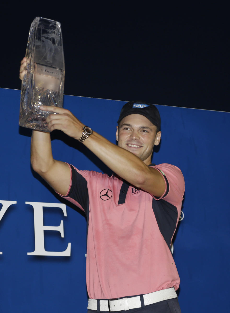 Martin Kaymer of Germany, lifts the The Players championship trophy TPC Sawgrass, Sunday, May 11, 2014 in Ponte Vedra Beach, Fla. (AP Photo/Lynne Sladky)