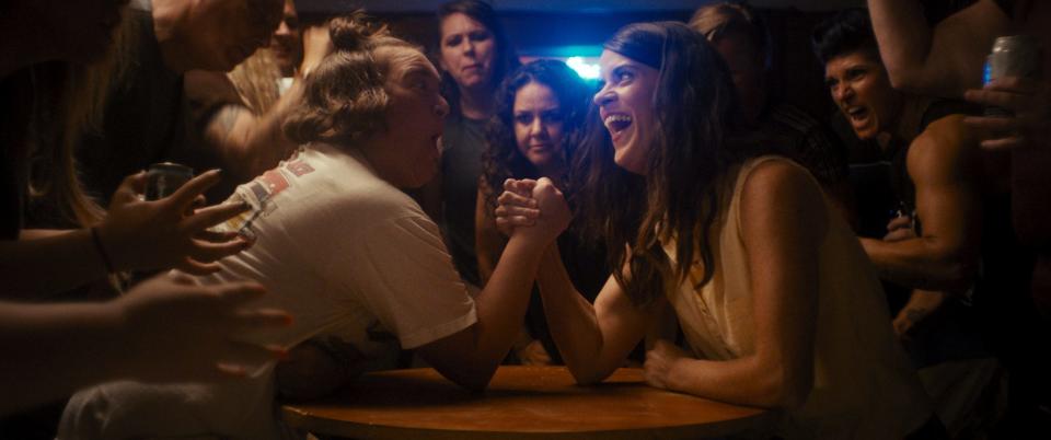 Buddy comedy "Golden Arm" stars Mary Holland (center right) as a baker persuaded by her best friend (Betsy Sodaro) to work her biceps and take her spot in the Women's Arm Wrestling Championship.