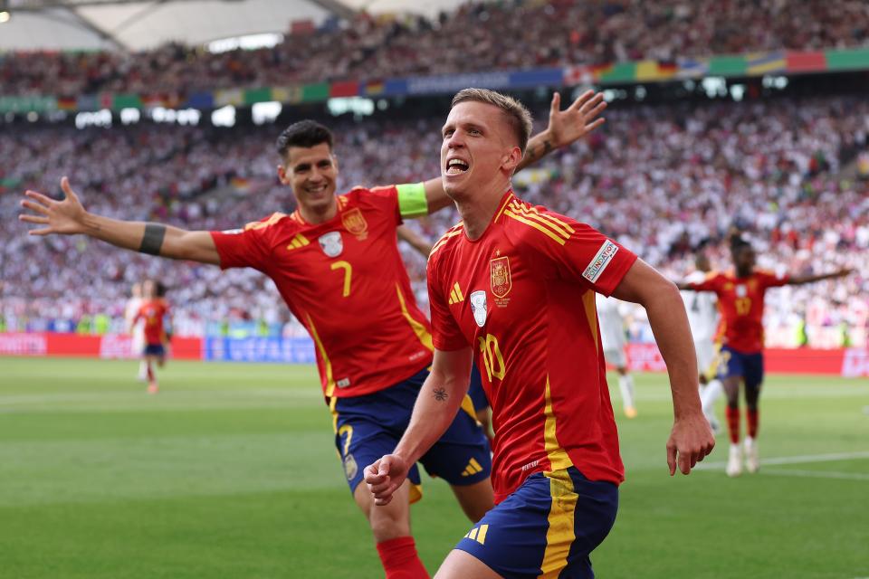 Dani Olmo (10) celebrates after scoring a goal in Spain's quarterfinal win over Germany.