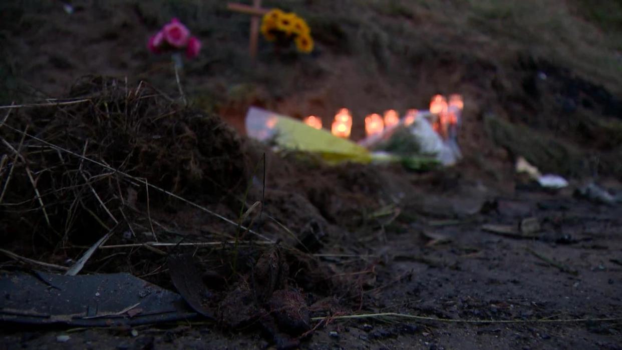 <div>Four people, including a baby boy, were killed over the weekend in Manteca after a crash on Highway 120, a site now filled with candles, flowers and a cross to mark the tragedy. Photo: KCRA</div>