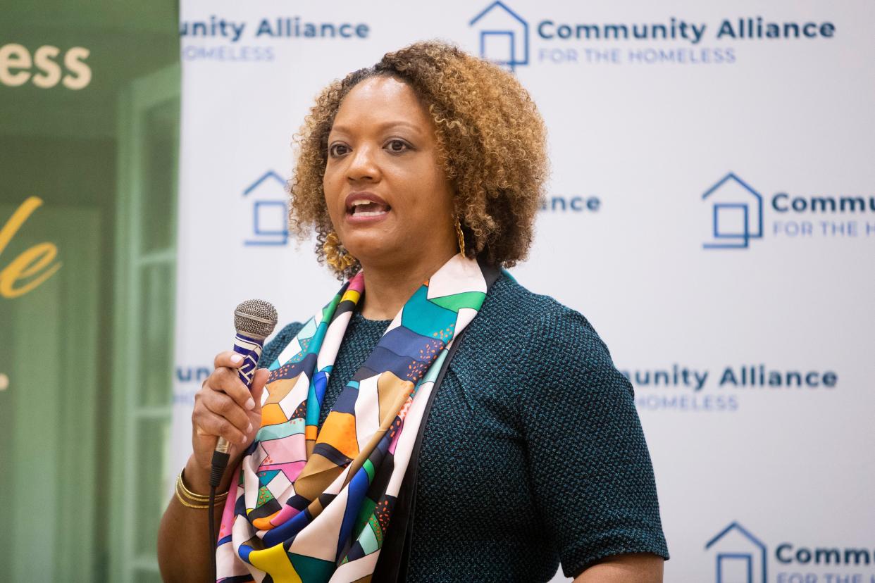 Dr. Michelle Taylor, Shelby County division director for health services, speaks to the assembled volunteers and organizers at the start of Project Homeless Connect at the Memphis Sports and Events Center in Memphis, Tenn., on Thursday, January 25, 2024.