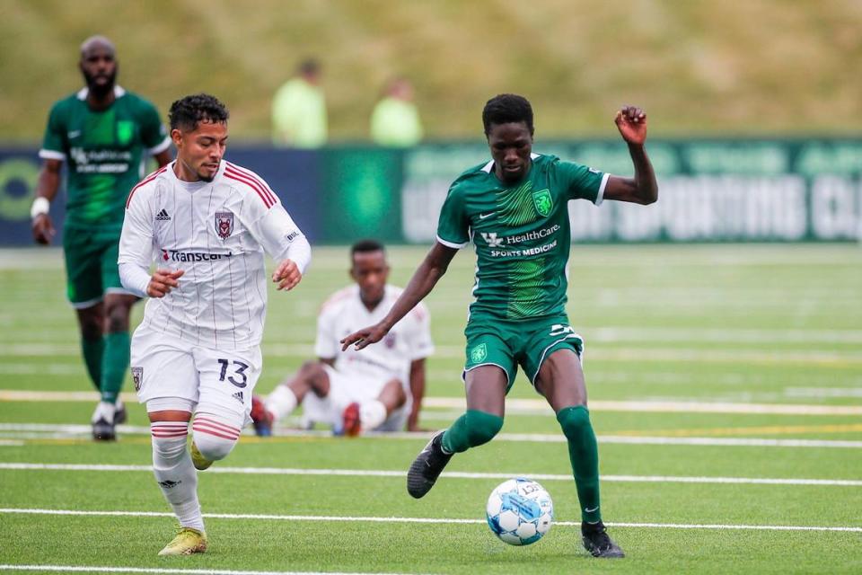 Lexington Sporting Club midfielder Ates Diouf (32) dribbles during a USL League One match against the Chattanooga Red Wolves at Toyota Stadium in Georgetown on June 16. Diouf is tied with two others for the team lead in goals with three this season.