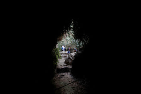 People visits Nahal David in the Ein Gedi Nature Reserve area, near the Dead Sea, Israel October 1, 2017. REUTERS/Ronen Zvulun