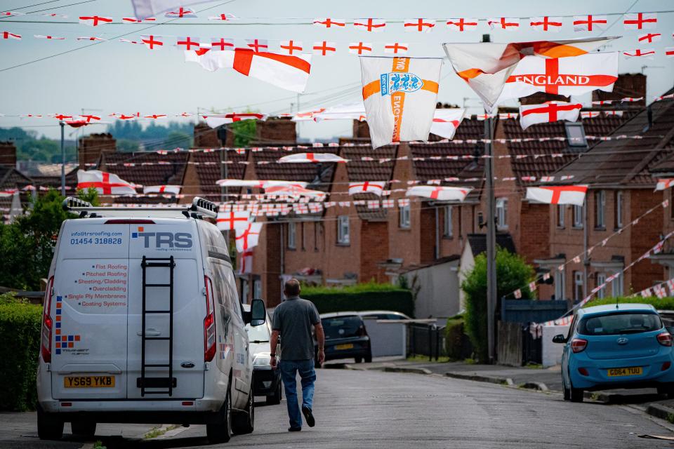 England flags hang across the street in Torrington Avenue, Knowe, Bristol (Ben Birchall/PA) (PA Wire)