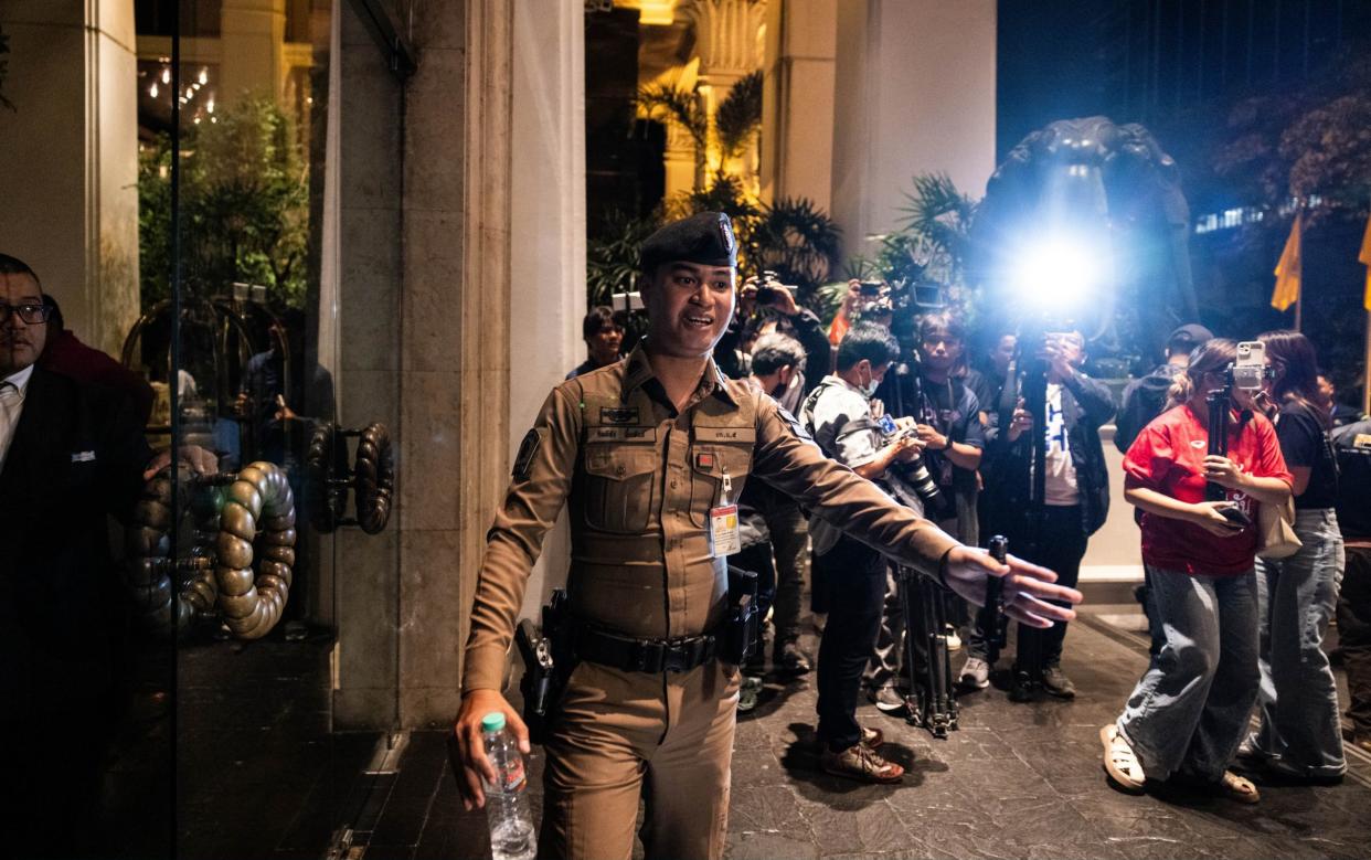 Police block media from entering the Grand Hyatt Erawan