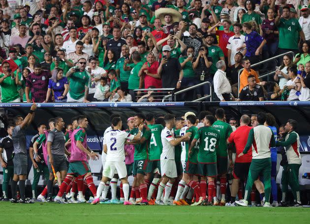 Fans look on as players from Mexico and the United States scuffle during the 2023 CONCACAF Nations League semifinals at Allegiant Stadium on June 15, 2023 in Las Vegas, Nevada. 