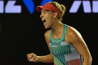 Germany's Angelique Kerber reacts as she plays against Serena Williams of the US during their women's singles final on day thirteen of the 2016 Australian Open tennis tournament in Melbourne on January 30, 2016