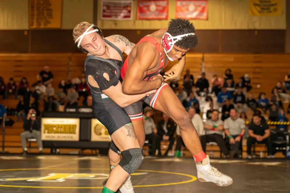 St. Joseph's Brian Christie wrestles St. Thomas Aquinas' Nazareth Pina in the 2023 GMCT 190-pound final