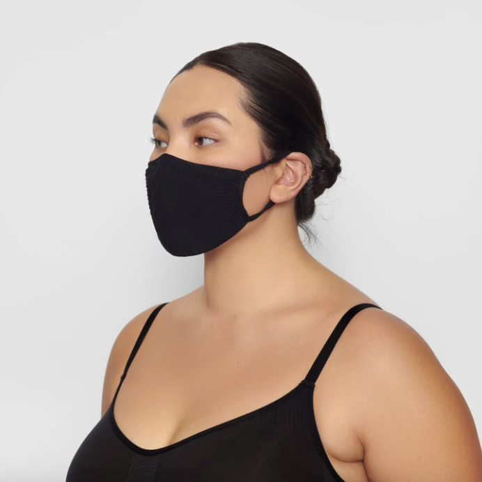 Adult Seamless Knit Face Mask in Onyx. Image via skims.com