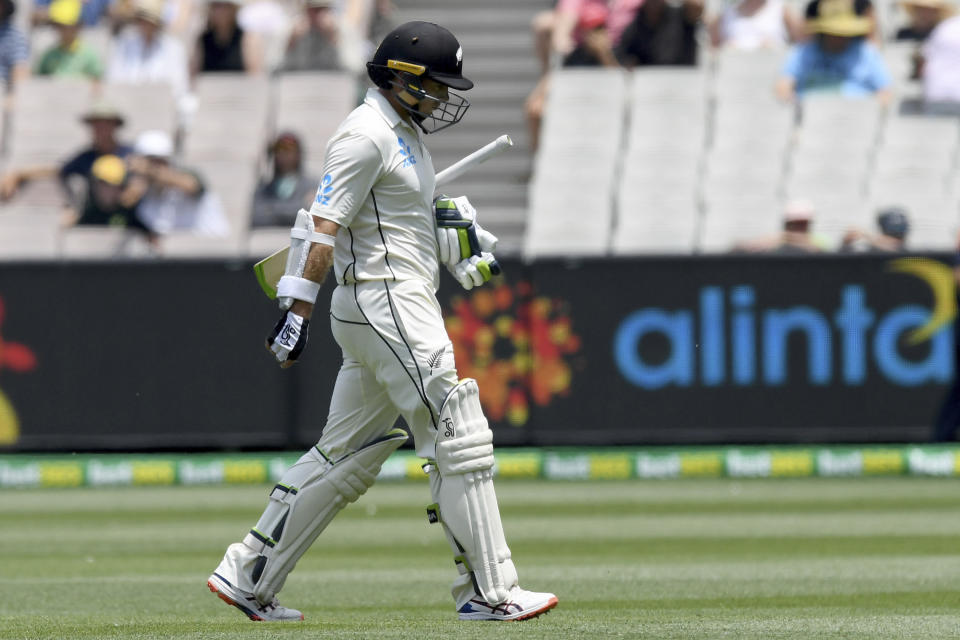 New Zealand's Tom Latham leaves the field after being dismissed by Australia during their cricket test match in Melbourne, Australia, Saturday, Dec. 28, 2019. (AP Photo/Andy Brownbill)