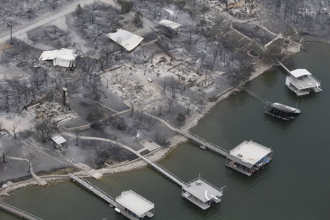 A row of homes on Gaines Bend are left in ashes on Possum Kingdom Lake on April 20, 2011.