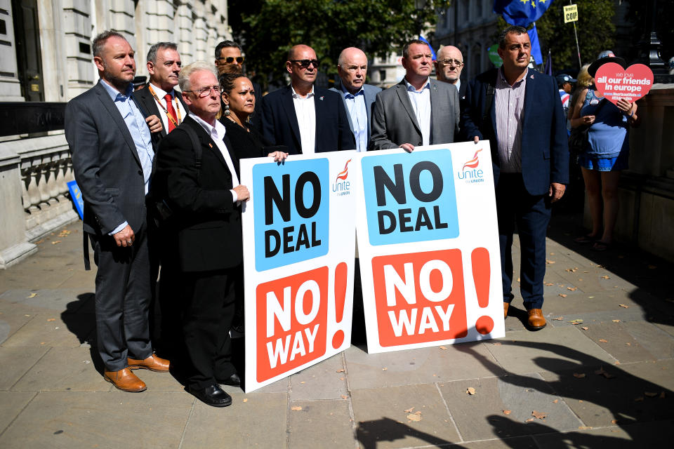 British Steel union representatives show placards as Demonstrators gather outside Cabinet Office waving Union and EU flags to protest against the Parliament suspension, Central London on August 29, 2019. Parliament will be suspended just days after MPs return to work in September - and only a few weeks before the Brexit deadline. (Photo by Alberto Pezzali/NurPhoto via Getty Images)