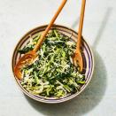 <p>Serve up this classic green coleslaw for a dish sure to please each and every one of your guests. </p><p>Get the <strong><a href="https://www.goodhousekeeping.com/food-recipes/a36547860/easy-coleslaw-dressing-recipe/" rel="nofollow noopener" target="_blank" data-ylk="slk:Green Slaw recipe;elm:context_link;itc:0;sec:content-canvas" class="link ">Green Slaw recipe</a></strong>. </p>