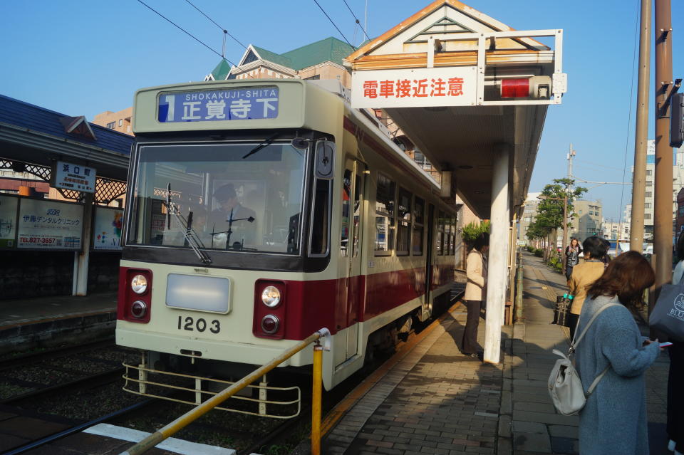 Commuters travel to work using the Nagasaki Electric Tramway. (Photo: Michael Walsh/Yahoo News)