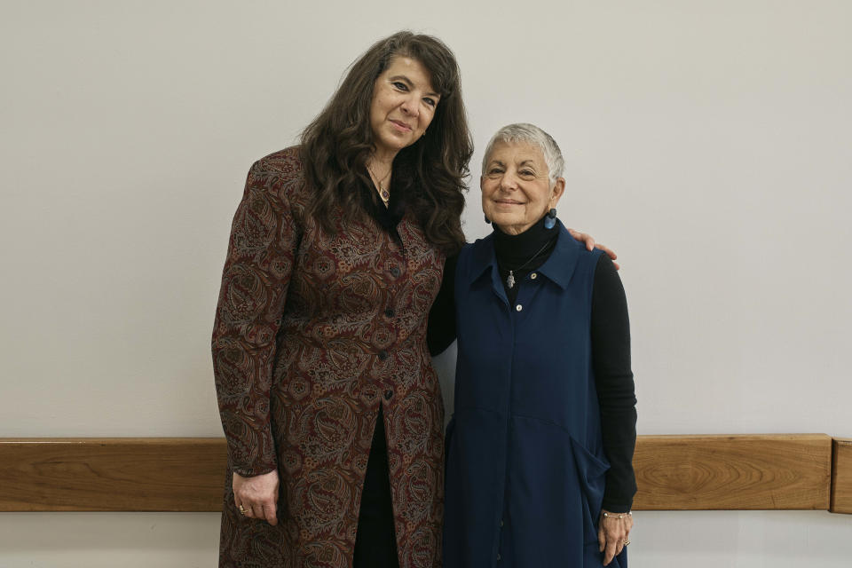 Organizers, activist Roberta Elliott, right, and attorney, educator and activist Atiya Aftab, left, pose for a picture as Muslim and Jewish women gather at an interfaith workshop on the Israeli-Palestinian conflict at Rutgers University on Sunday, Nov. 19, 2023, in New Brunswick, N.J. The latest violence, triggered by the Oct. 7 Hamas attack on Israel, is prompting some to question such dialogue, its role, impact -- or how to even have it-- while steeling the resolve of others to connect and wrestle together with the challenges. (AP Photo/Andres Kudacki)