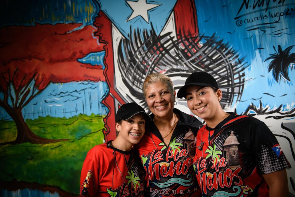 Three generations, Aleisha Torres, left to right, Damaris Arroyo and Ana Arroyo, at La Isla Menos Restaurant at 594 S. Reilly Road.