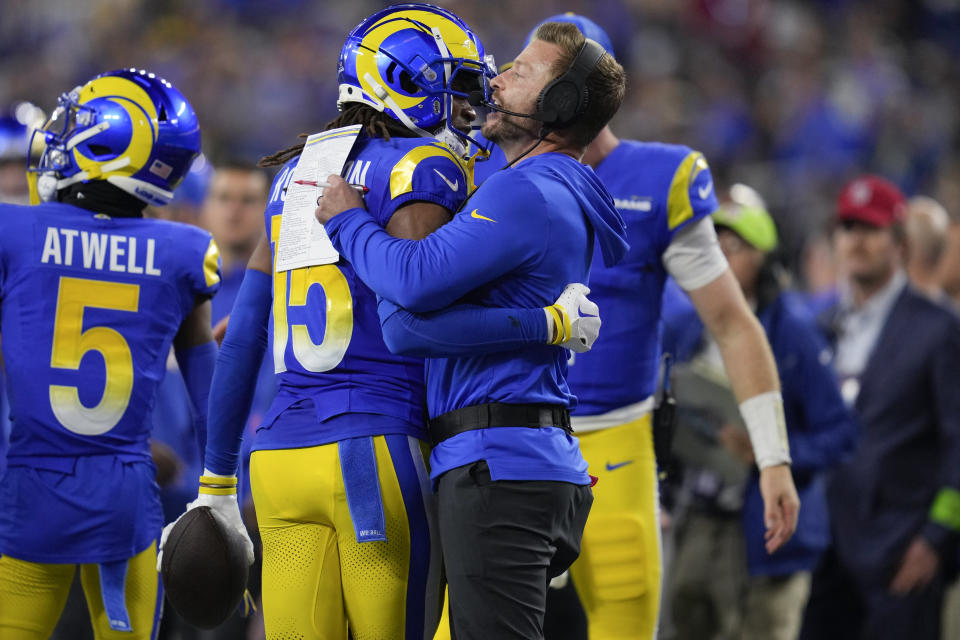 Los Angeles Rams wide receiver Demarcus Robinson (15) celebrates his touchdown catch with head coach Sean McVay during the first half of an NFL football game against the New Orleans Saints, Thursday, Dec. 21, 2023, in Inglewood, Calif. (AP Photo/Ashley Landis)