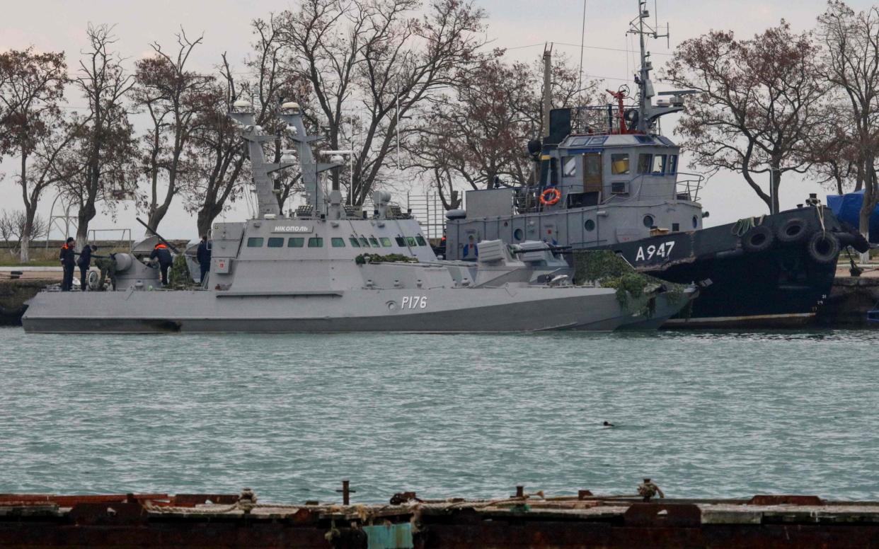 Russia is set to return Ukrainian navy ships seized a year ago, as it prepares for a summit to try to resolve the wider conflict  - AFP