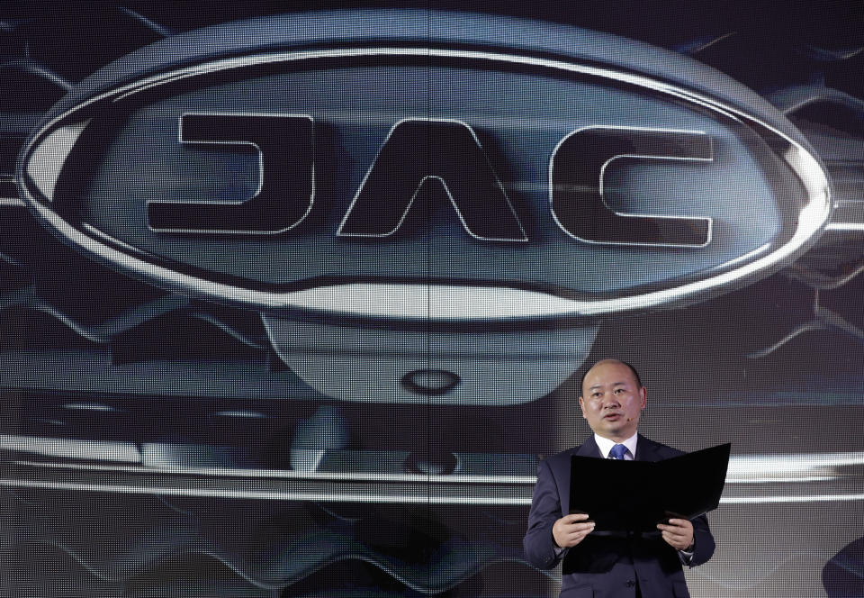 JAC General Manager Xiang Xingchu addresses media and guests during the presentation of an SUV model built in Mexico for the Chinese state-owned automaker, in the country's first JAC showroom, in Naucalpan on the outskirts of Mexico City, Tuesday, March 28, 2017. Mexico announced last month a 4.4 billion peso ($212 million) deal to assemble Chinese cars in the central state of Hidalgo, amid calls for the country to diversify economic ties as tensions have risen with the U.S., its largest trade partner. (AP Photo/Rebecca Blackwell)