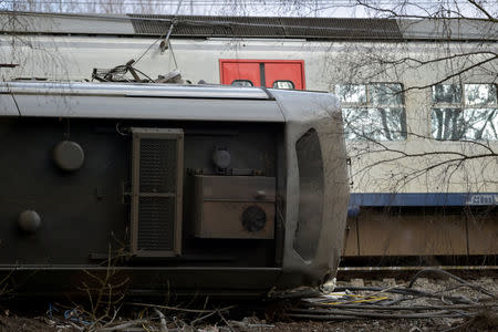 The wreckage of a passenger train is seen after it derailed in Kessel-Lo near Leuven, Belgium February 18, 2017. REUTERS/Eric Vidal