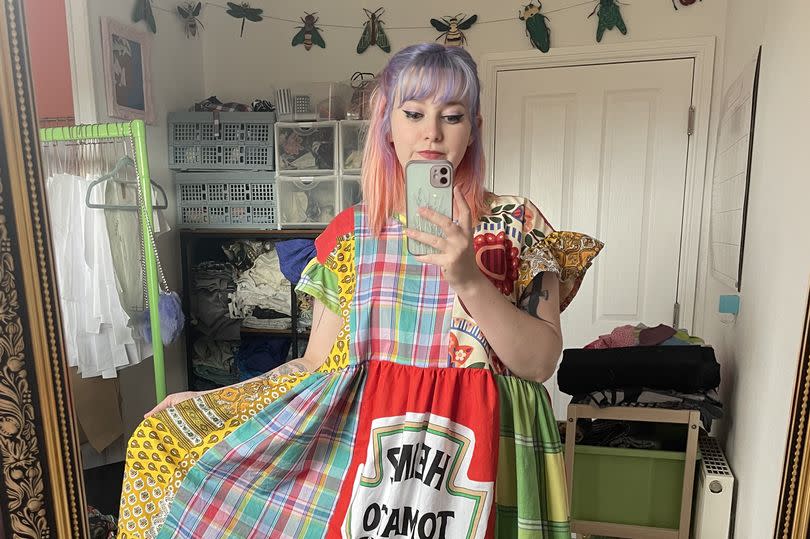 Scarlett Hawkes, 28, wearing one her patchwork outfits made with a Heinz ketchup tea towel.