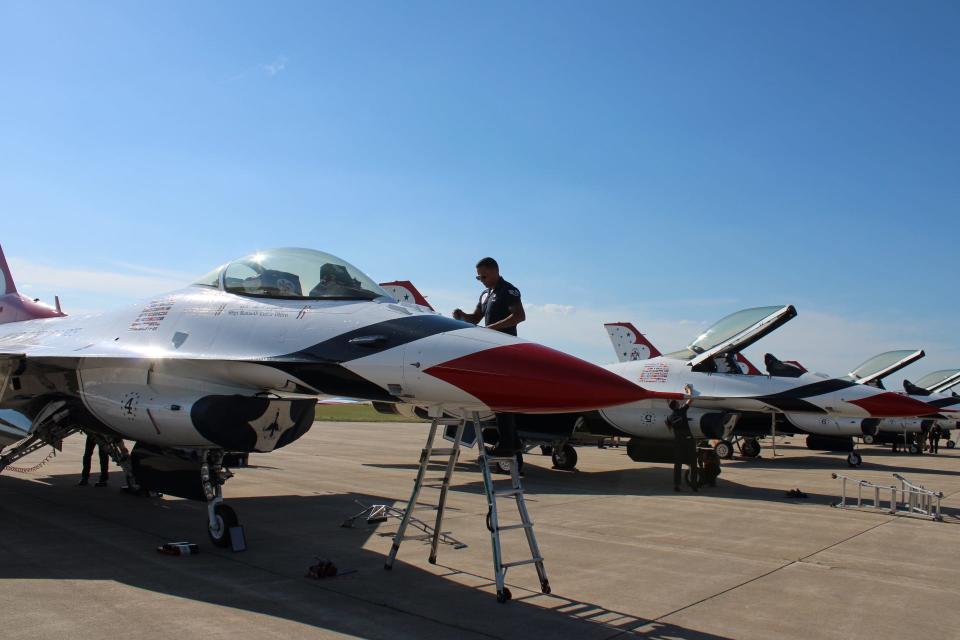 Crews tend to the F-16 Thunderbird jets at Battle Creek Executive Airport Thursday, June 30. The Thunderbirds will take to the skies this weekend as part of the Battle Creek Field of Flight Air Show and Balloon Festival.