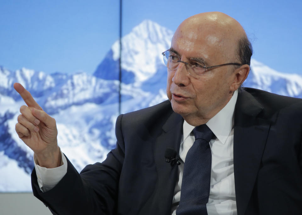 Brazil's Economy Minister Henrique Meirelles speaks during a panel discussion on the second day of the annual meeting of the World Economic Forum in Davos, Switzerland, Wednesday, Jan. 18, 2017. (AP Photo/Michel Euler)