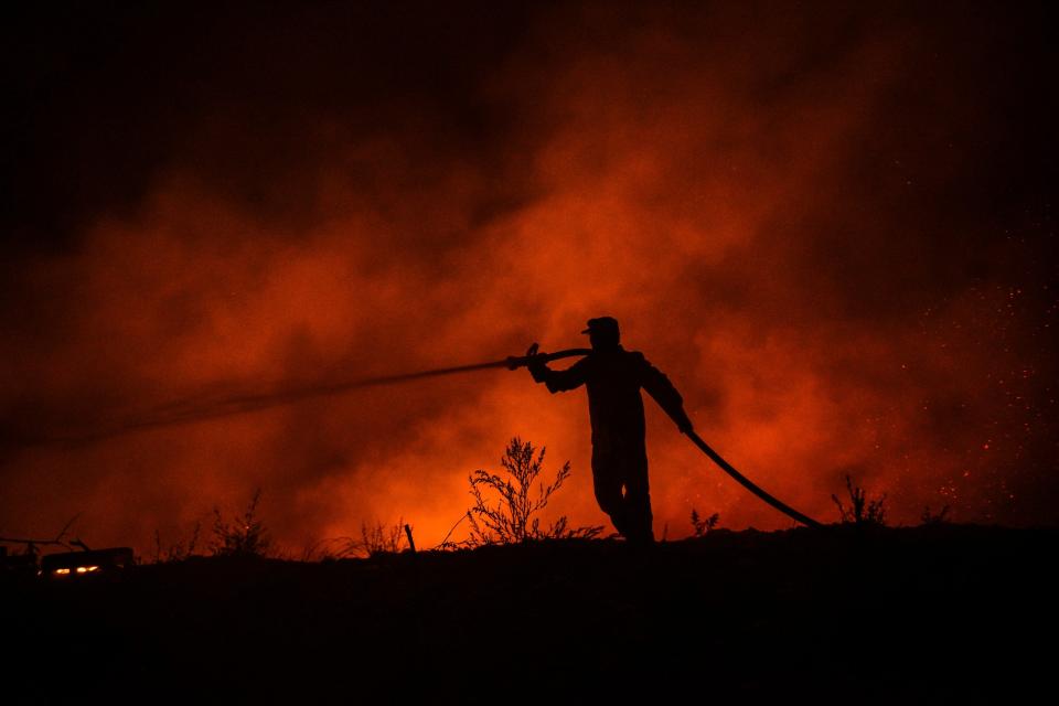 Four people have died in wildfires in neighbouring Turkey (Copyright 2021 The Associated Press. All rights reserved)