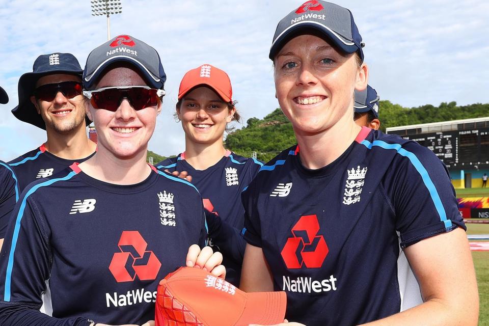 Debut delight: Heather Knight gives Kirstie Gordon her cap on Monday: IDI via Getty Images