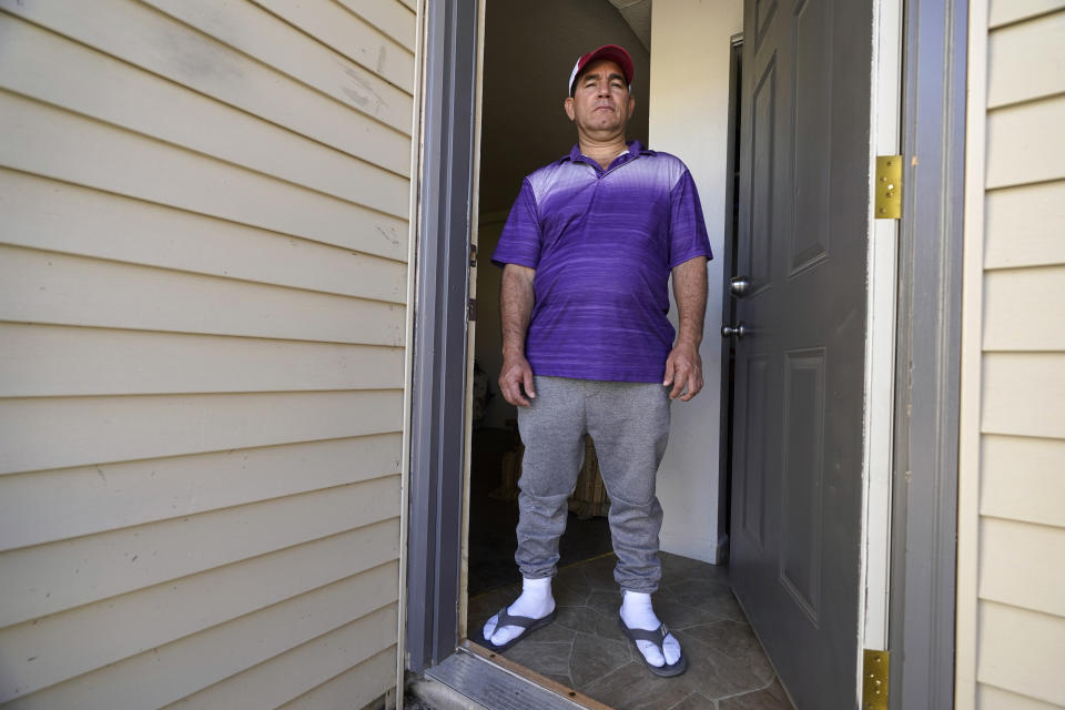 Rolando José Cisneros Borroto in his apartment, Friday, Aug. 26, 2022, in Algona, Iowa. (AP Photo/Charlie Neibergall)