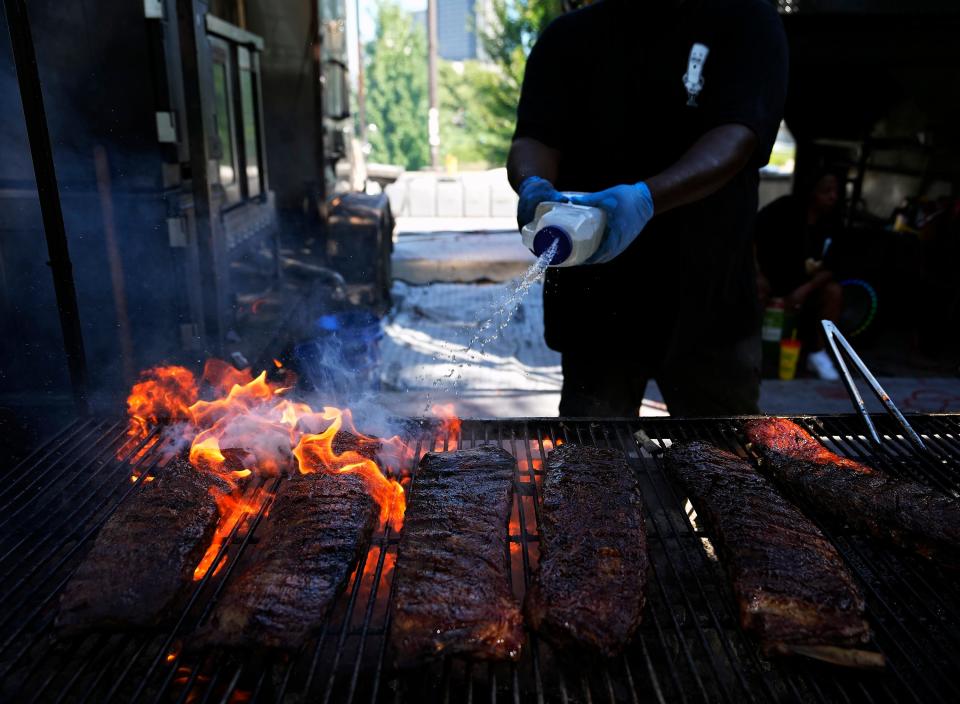 Music won't be the only attraction at the Jazz & Rib Fest, where attendees will queue up for 'cue this weekend in Downtown Columbus. Off the Bone BBQ from Mobile, Alabama, pictured at the 2022 festival, will join more than a dozen other vendors at this year's event.