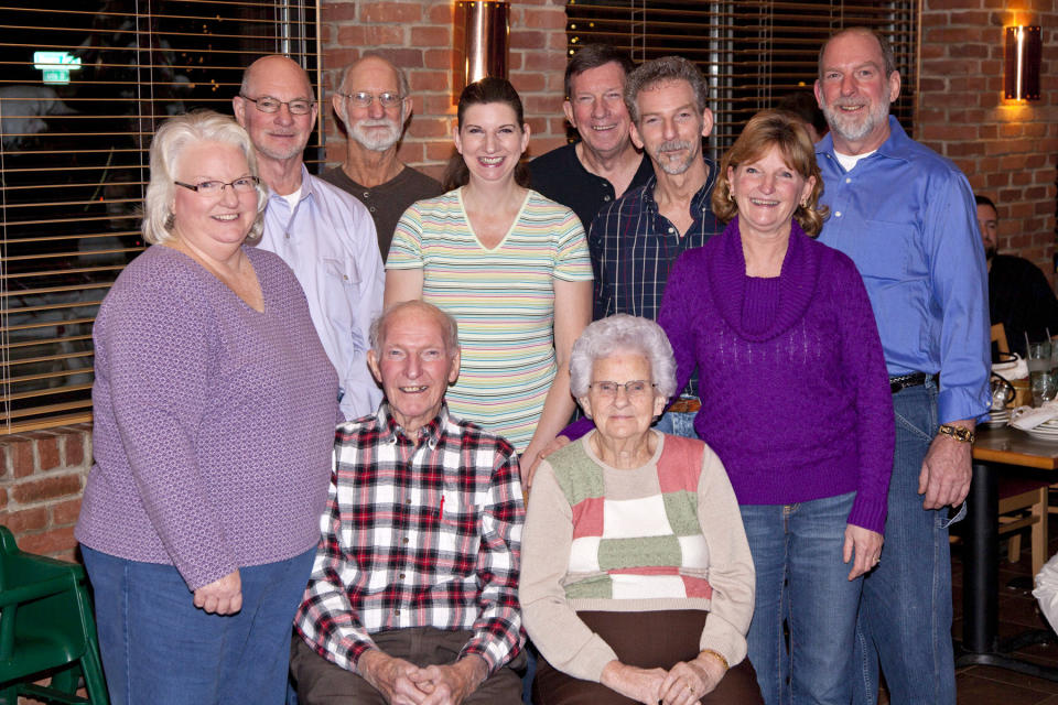 In this Dec. 29, 2012, photo provided by Dick Felumlee, Kenneth and Helen Felumlee, seated, of Nashport, Ohio., in central Ohio pose for a photo with their eight children. The Felumlees, who celebrated their 70th wedding anniversary in February, died 15 hours apart from each other last week. (AP Photo/Dick Felumlee)