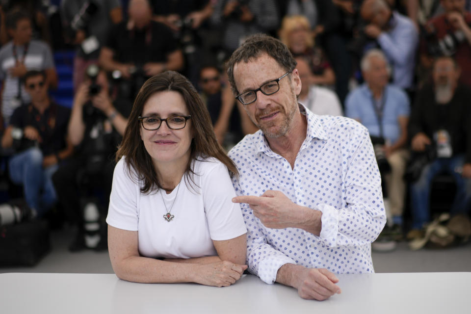 Tricia Cooke, left, and director Ethan Coen pose for photographers at the photo call for the film 'Jerry Lee Lewis: Trouble in Mind' at the 75th international film festival, Cannes, southern France, Monday, May 23, 2022. (AP Photo/Daniel Cole)