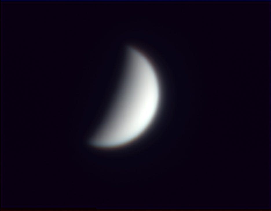 This Nov. 9 picture made through the author's 14-inch telescope shows the planet Venus and its crescent phase. In the coming month, the phase of Venus will shrink to a much thinner crescent while its apparent diameter grows due to it passing closer to Earth.