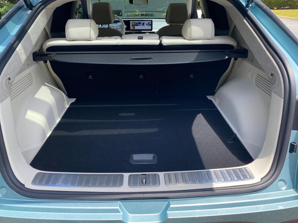 The cargo area behind the rear seats of a 2024 Genesis GV60 EV.