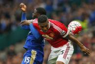 Britain Football Soccer - Manchester United v Leicester City - Barclays Premier League - Old Trafford - 1/5/16 Manchester United's Antonio Valencia in action with Leicester's Jefferey Schlupp Action Images via Reuters / Jason Cairnduff