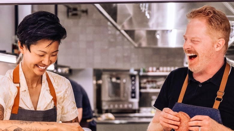 Kristen Kish and man laughing 