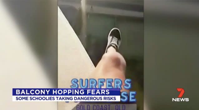 Another filmed themselves dangling off a building ledge. Source: 7 News