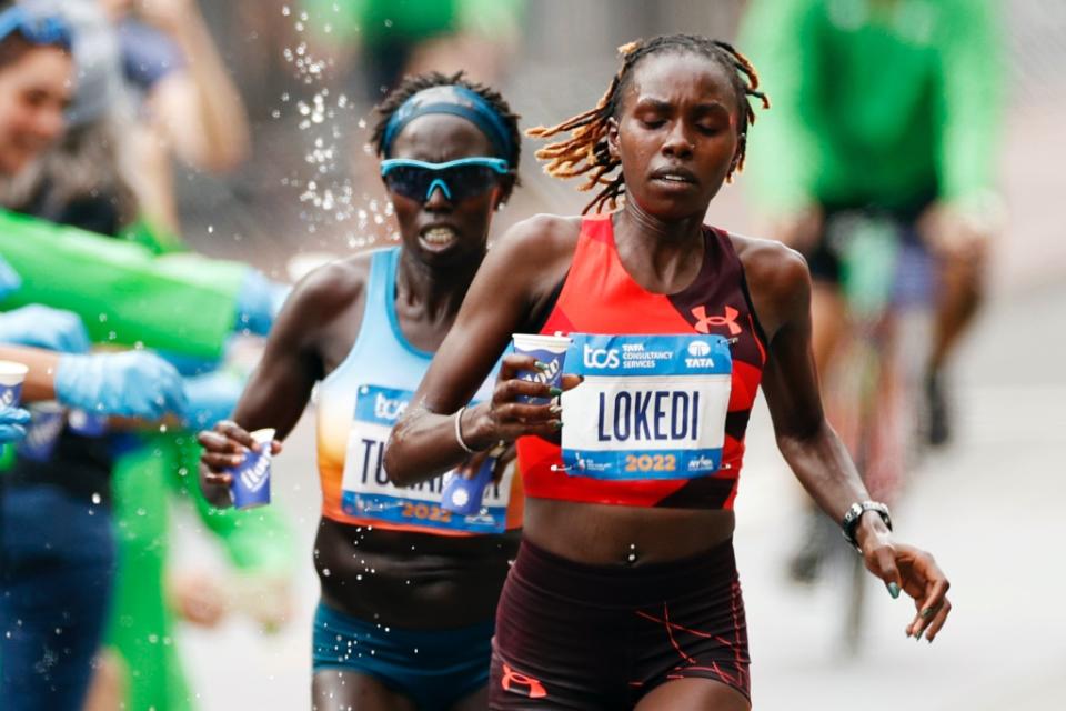 Sharon Lokedi (Kenya) and Aliphine Tuliamuk (United States) compete in the Women’s Professional Division of the TCS New York City Marathon in New York City on Nov. 6, 2022. - Credit: Sarah Stier/Getty Images