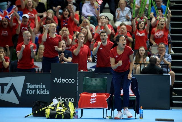 Anne Keothavong cheers on Johanna Konta during a Billie Jean King Cup tie