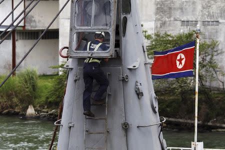 A worker inspects the North Korean flagged ship "Chong Chon Gang" docked at the Manzanillo Container Terminal in Colon City in this July 16, 2013 file photo. REUTERS/Carlos Jasso/Files