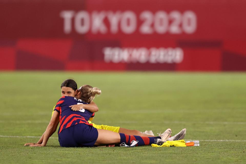 Team USA's Kristie Mewis comforts Australian star Sam Kerr following the USWNT's bronze-medal victory over the Matildas.