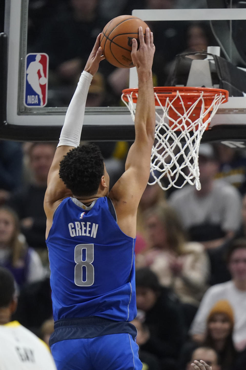 CORRECTS NAME TO JOSH GREEN INSTEAD OF MARKIEFF MORRIS - Dallas Mavericks guard Josh Green (8) dunks against the Utah Jazz during the second half of an NBA basketball game, Monday, Feb. 6, 2023, in Salt Lake City. (AP Photo/Rick Bowmer)