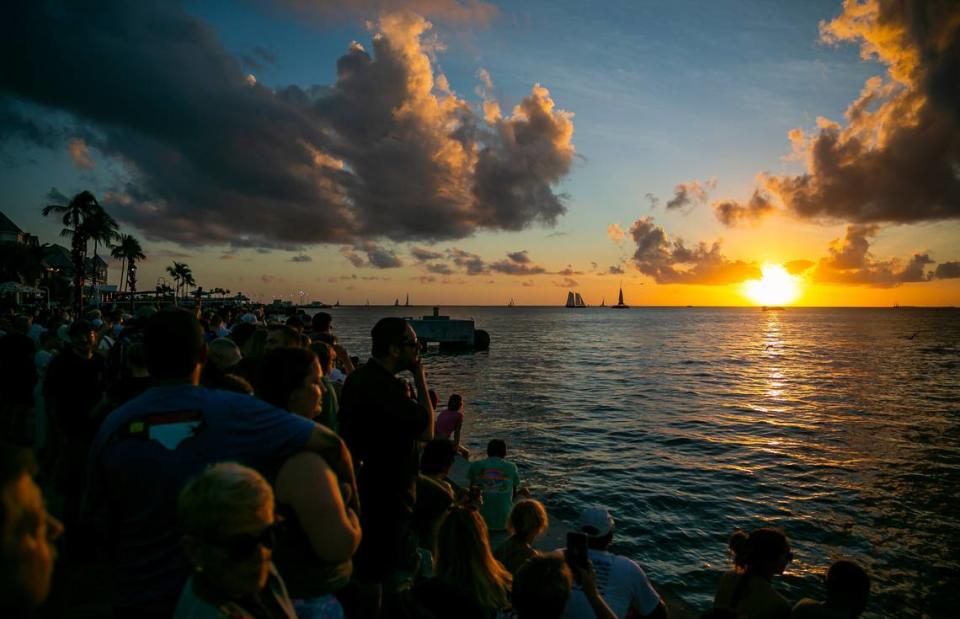 A crowd watches the sunset from Mallory Square in Key West.