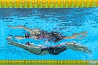 <p>An underwater view shows USA's Regan Smith competing in the final of the women's 100m backstroke swimming event during the Tokyo 2020 Olympic Games at the Tokyo Aquatics Centre in Tokyo on July 27, 2021. (Photo by François-Xavier MARIT / AFP)</p> 