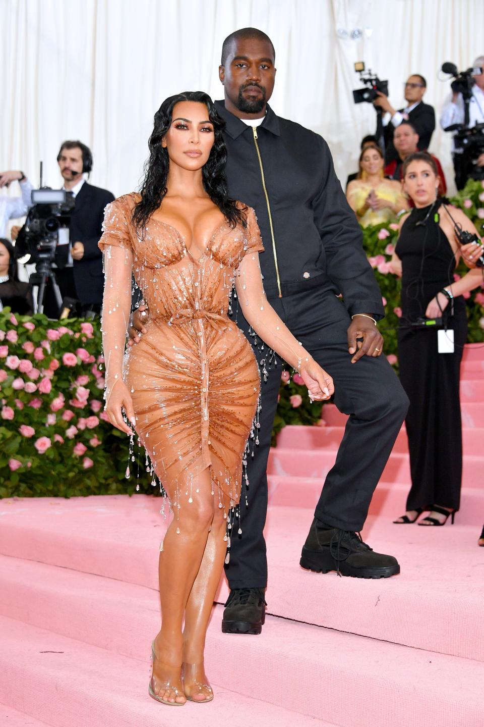 <h1 class="title">Kim Kardashian West in Manfred Thierry Mugler and Kanye West</h1><cite class="credit">Photo: Getty Images</cite>