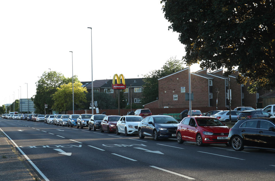 Cars queue at the McDonald's drive-thru in Hounslow. Source: PA via AAP