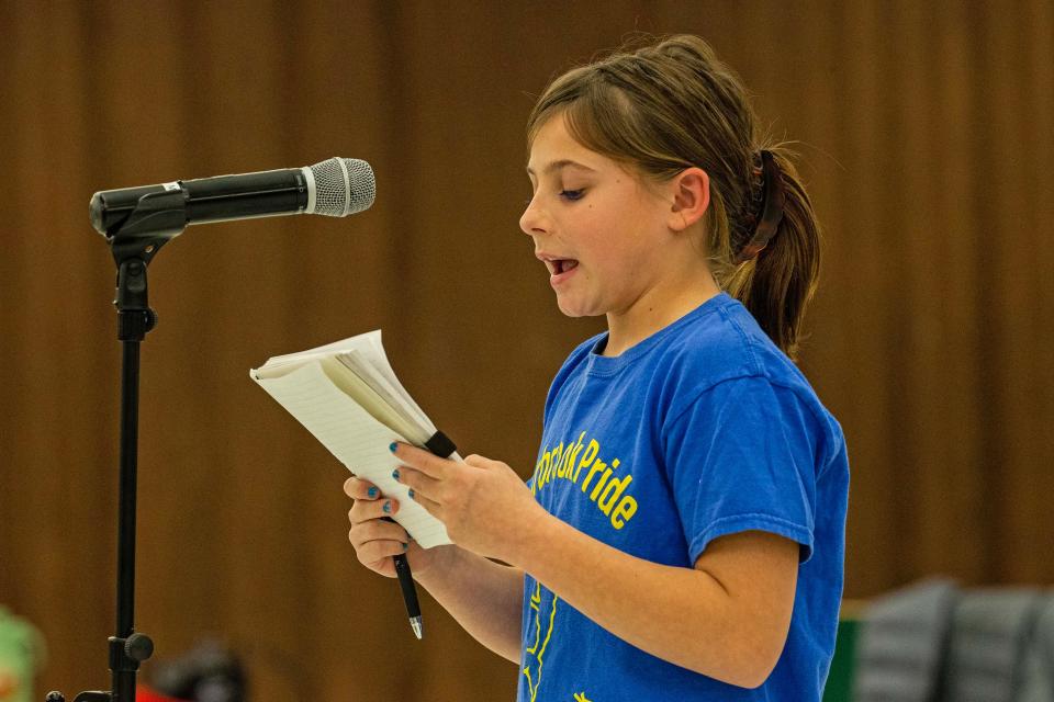 Student Gianna Howard gives a speech in English and Spanish during a parent meeting held at Marbrook Elementary School in Wilmington, Tuesday, Dec. 5, 2023. Red Clay Consolidated School District is considering phasing out Spanish immersion instruction at the school.